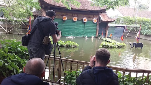 Filming water puppet show Hanoi